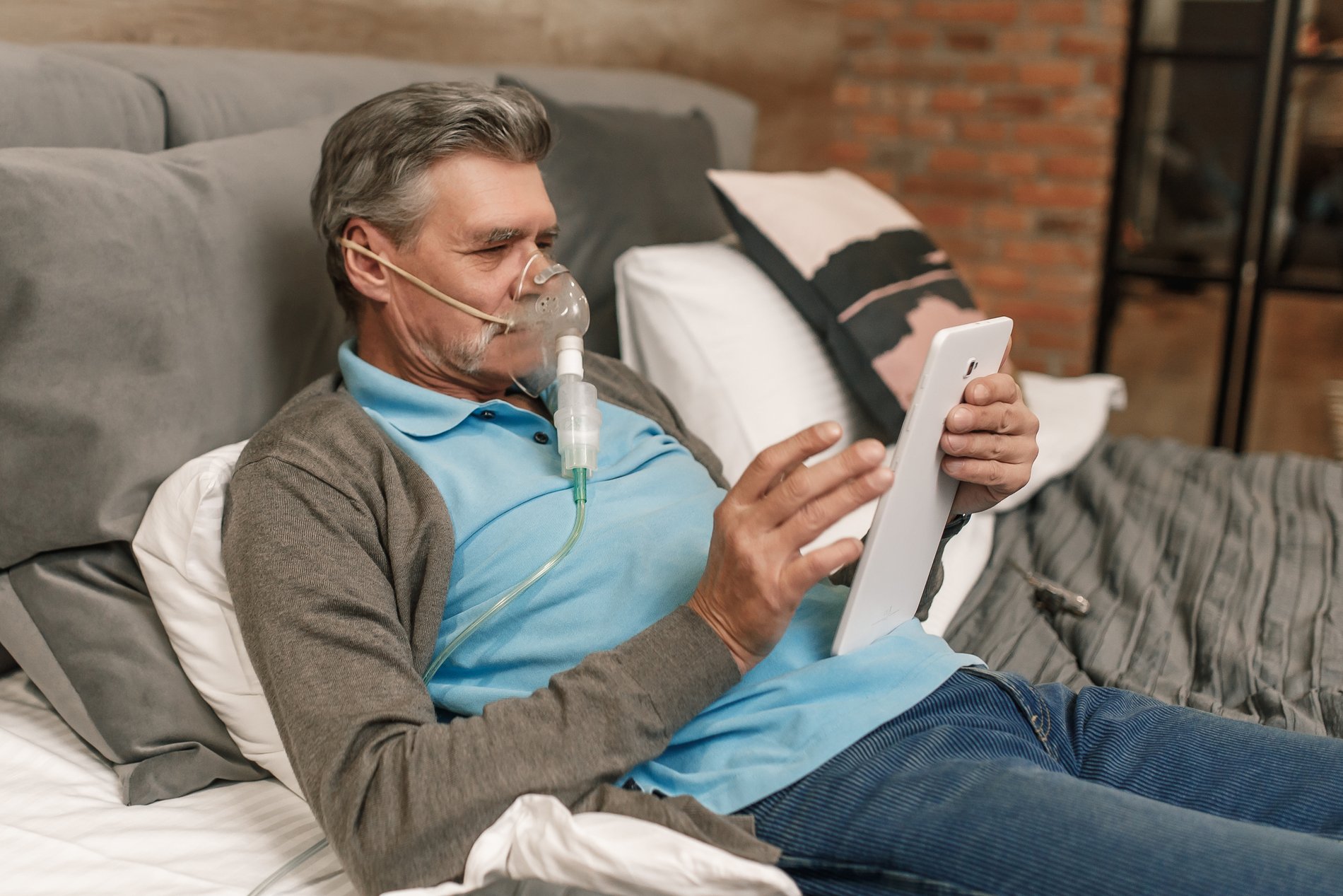 Person using home oxygen equipment