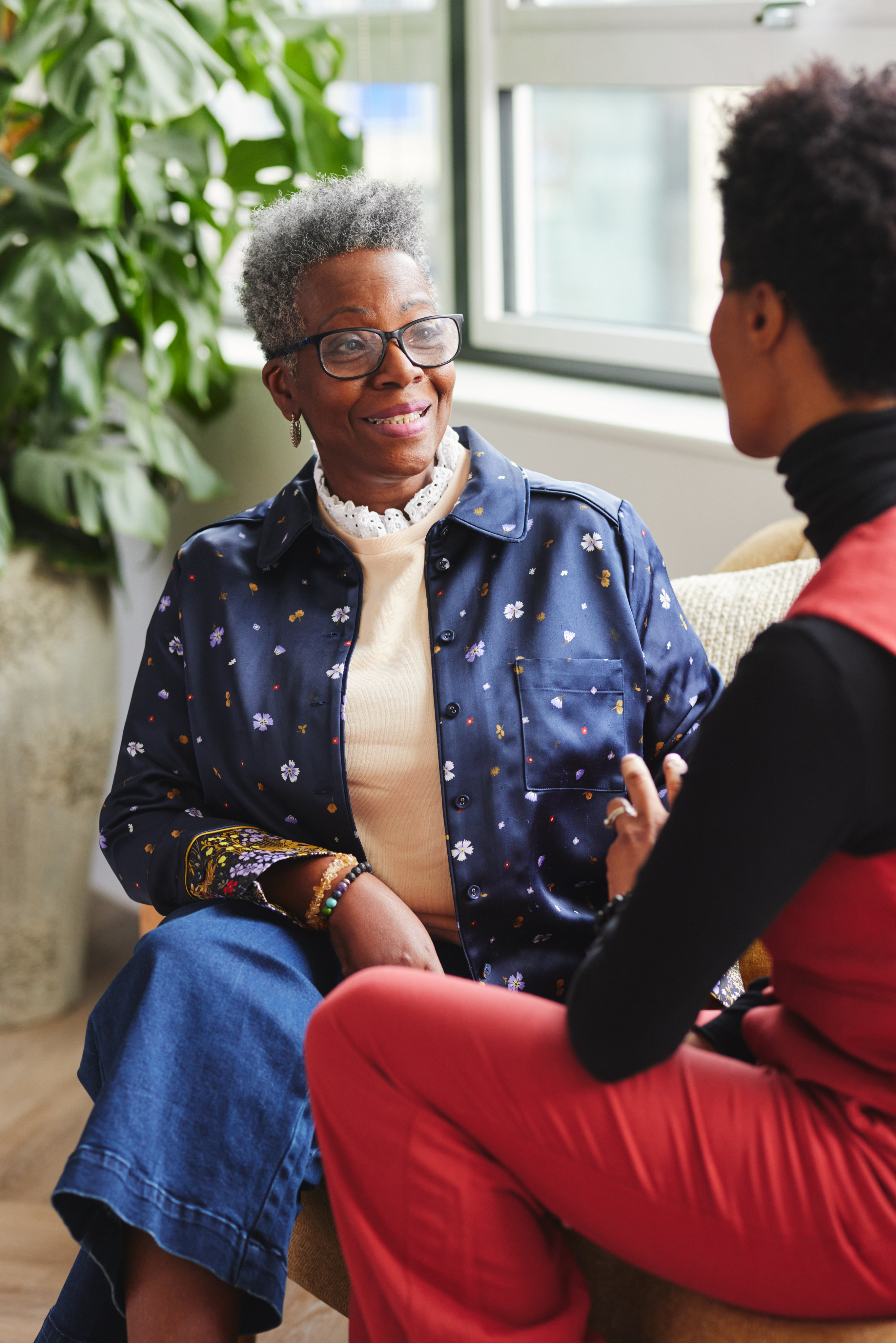 Advocate speaking with a patient and family member